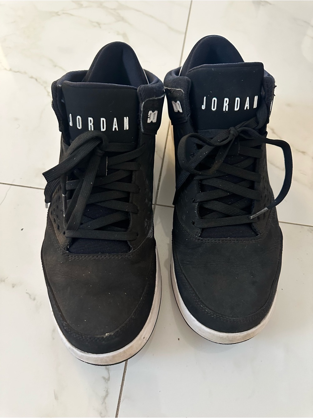 Jordan Black Mid-Top Sneakers with White Sole Accents